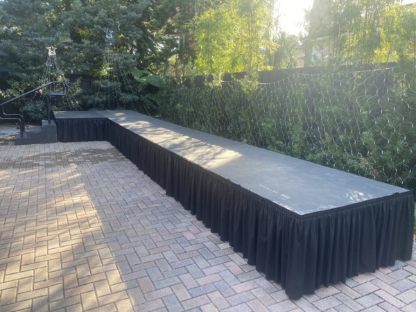 12-4-21 8x8x24 stage with 4x24 runway skirt L shape stage